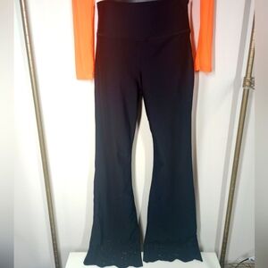 Yoga Pants. Becca. Size: L. Color: Black. Floral Cutout Hemline